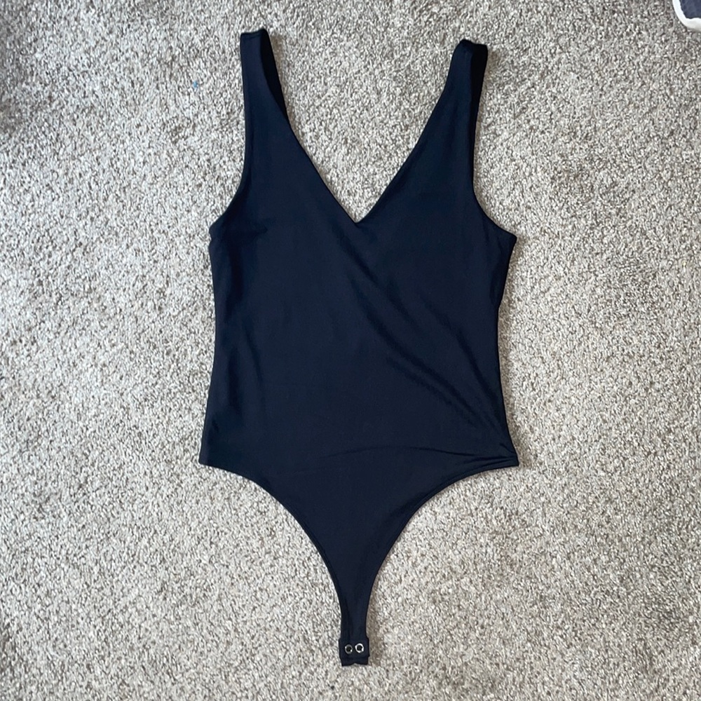 Plain black body suit